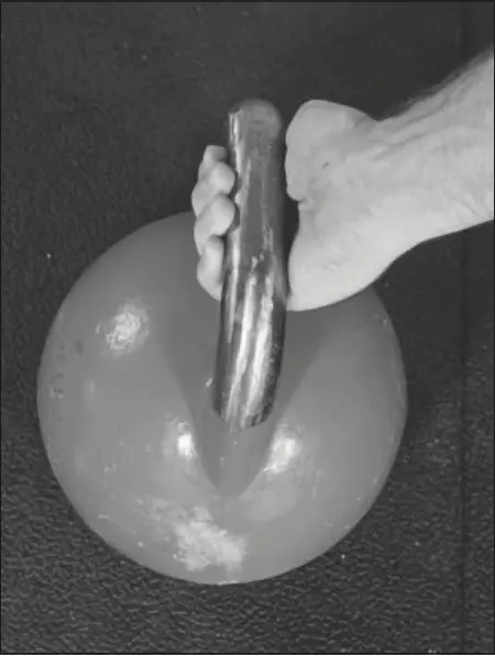Figure 6.2 Alternative kettlebell grip where the thumb is outside the handle.
